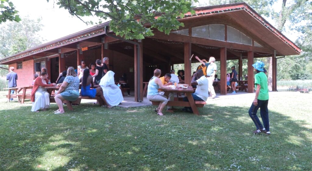 People gathering and eating at event 